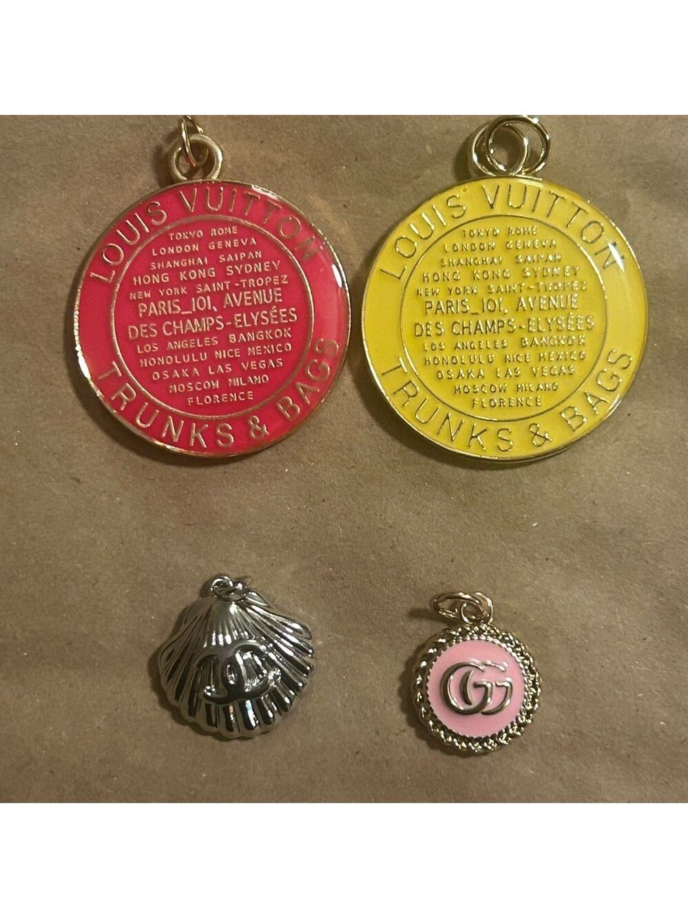 Lv ,gg  and cc charm from bag / zipper pulls pick one